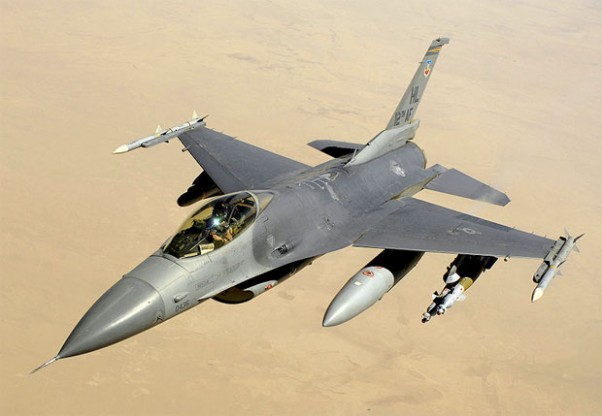 A U.S. Air Force Block 40 F-16 Fighting Falcon aircraft returns to the fight after receiving fuel from a KC-135 Stratotanker aircraft during a mission over Iraq on June 10, 2008
