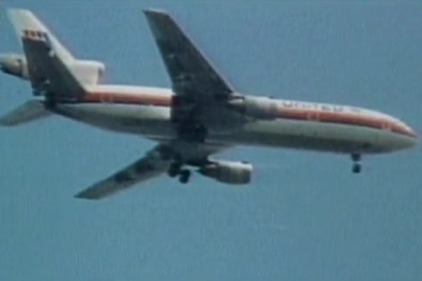 United Flight 232 on final descent, with visible damage to its tail.