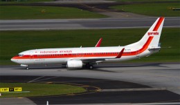 The retro liveried Garuda Indonesian Airways Boeing 737-800 PK-GFM taxis at Singapore