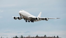 first Boeing 747-8 Intercontinental A7-HHE takes off on its delivery flight.