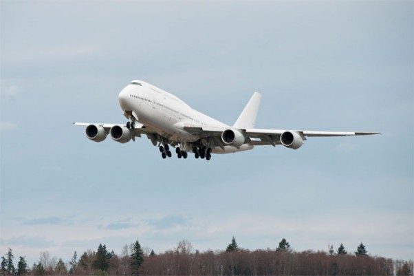 first Boeing 747-8 Intercontinental A7-HHE takes off on its delivery flight.