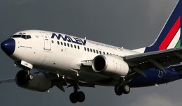 A Malev 737-600 HA-LOE and its signature blue nose on short final for Amsterdam.