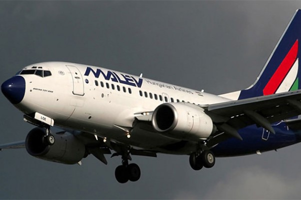 A Malev 737-600 HA-LOE and its signature blue nose on short final for Amsterdam.
