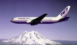The Boeing 767 prototype (N767BA) flies over Washington's Mt. Rainier.