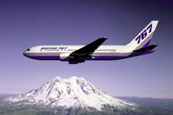 The Boeing 767 prototype (N767BA) flies over Washington's Mt. Rainier.