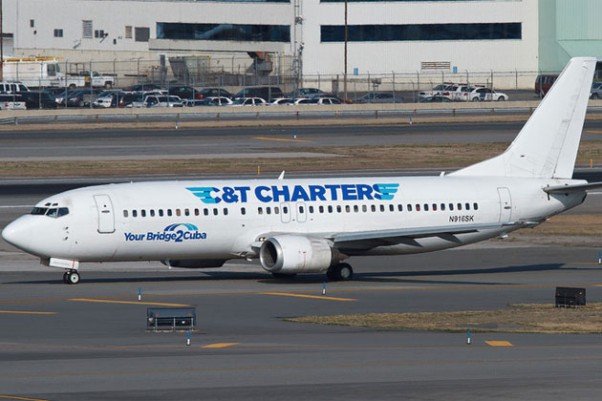 C&T Charters, "Your Bridge to Cuba," charters this SkyKing 737-400 (N916SK), for flights between JFK and Havana. (Photo by John Klos)