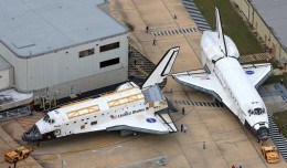 Space Shuttle Discovery passes Atlantis on her journey to the VAB, and later, the Smithsonian. For a brief few seconds, the two spacecraft were a few feet apart, a scene which will never be replicated.