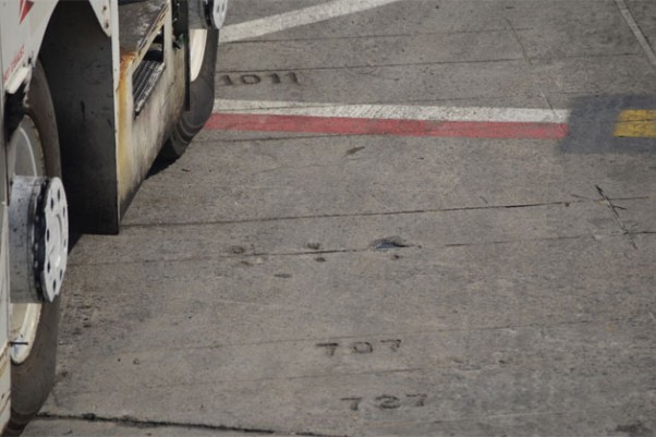 Markings for planes of yesteryear engraved into the ramp at JFK's Terminal 3, formerly known as the Pan Am Worldport.
