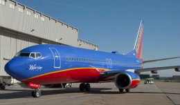 Southwest's first Boeing 737-800 N8301J Warrior One, taxis to its welcoming party.