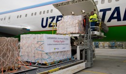 Pallets of medical supplies are loaded onto a new Uzbekistan Airways Boeing 767-300ER