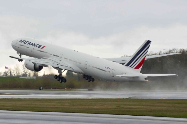 Air France's newest Boeing 777-300ER (F-GZNL) takes off for Paris on its delivery flight. (Photo by Boeing)