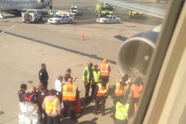 Damaged fan blades are visible in Delta 1063's right engine. (Photo by Grant Cardone, via Twitter)