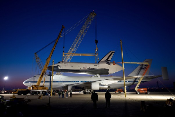 In preparation for its flight to New York, Space Shuttle Enterprise is mounted to the top of the Boeing 747 Shuttle Carrier Aircraft at Dulles Airport early Friday morning. (Photo by NASA/Bill Ingals)