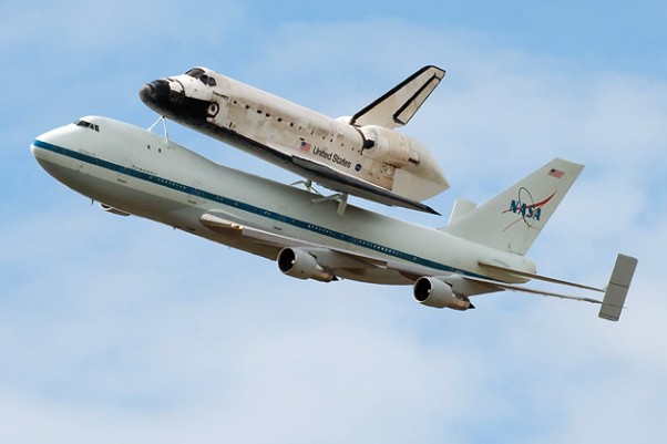 Space Shuttle Discovery hitching a ride on the Boeing 747 Shuttle Carrier Aircraft. (Photo by NASA)