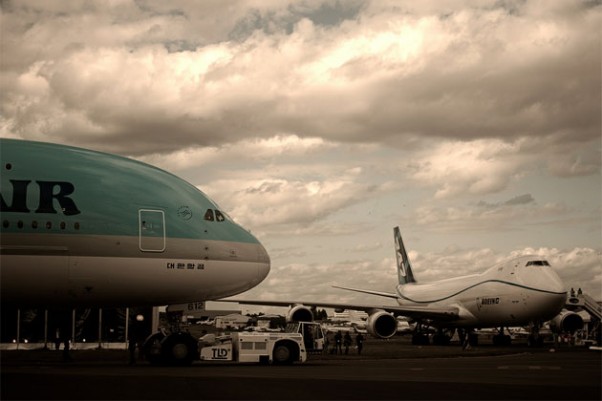 An Airbus A380 and Boeing 747-8 Freighter on display at the 2011 Paris Air Show. (Photo by Rohan Visvanathan, via Flickr, CC BY-NC-ND)