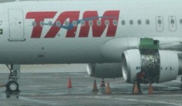 TAM Airbus A320 with broken engine cowling