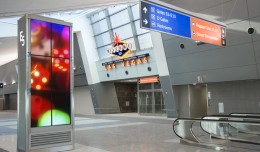 Terminal 3 is adorned with colorful signage. (Courtesy of Clark County Department of Aviation)