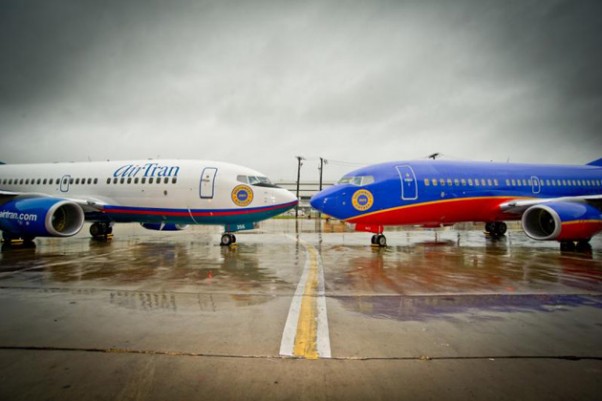 Southwest and AirTran Boeing 737s nose to nose. (Photo by Southwest Airlines)