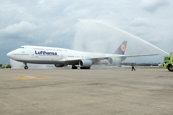 Lufthansa's first Boeing 747-8 Intercontinental (D-ABYA) receives a water cannon salute upon arrival at Washington Dulles. (Photo by Cary Liao/NYCAviation)