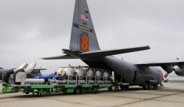 Modular Airborne FireFighting System (MAFFS) being loaded onto an Air Force C-130 Hercules. (Photo by US Air Force)