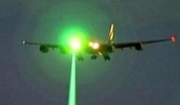 Green laser shining on an aircraft. (Photo by Dept of Transportation)