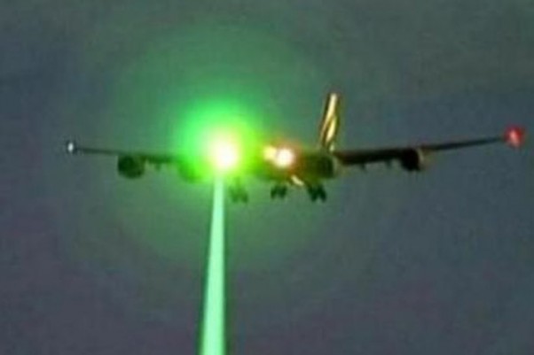 Green laser shining on an aircraft. (Photo by Dept of Transportation)