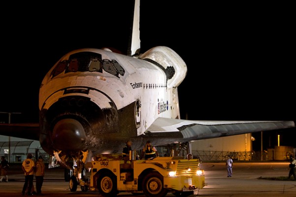 Space shuttle Endeavour is towed before dawn on September 14th from her storage in the Vehicle Assembly Building to the Space Shuttle Landing Facility to be hoisted on to the back of the SCA. (Photo by Suresh Atapattu)