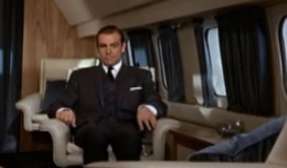 James Bond is about to give Goldfinger a physics lesson.