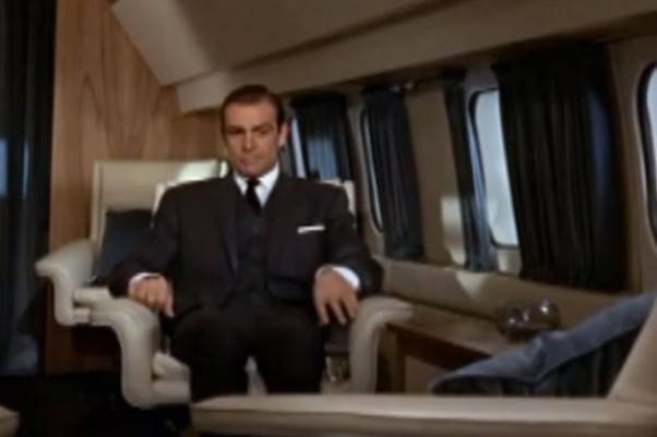 James Bond is about to give Goldfinger a physics lesson.
