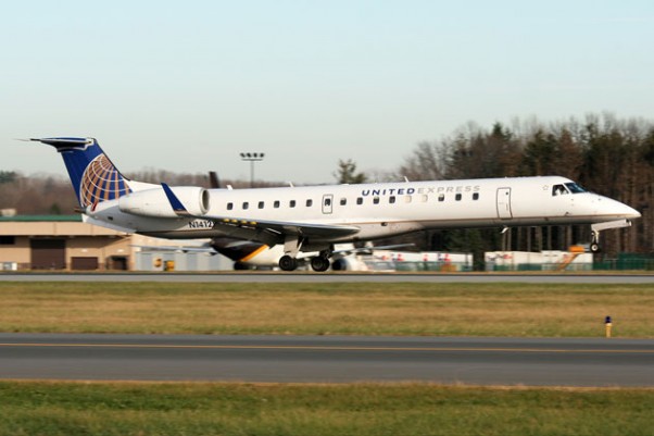 A United Express Embraer ERJ-145XR (N14125) touches down in Toronto. (Photo by Kaz T)