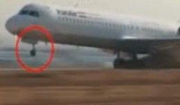 Iran Air Fokker 100 landing with nose gear failure.