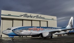 Alaska Airlines reveals its fish-patterned Boeing 737-800 (N559AS) dubbed "Salmon-Thirty-Salmon II." (Photo by Alaska Airlines)