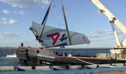 The vertical stabilizer of American Airlines Flight 587 is lifted out of Jamaica Bay. (Photo by NTSB)