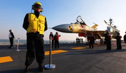 A carrier-borne J-15 fighter jet on China’s first aircraft carrier, the Liaoning. (Photo by Xinhua News Agency)