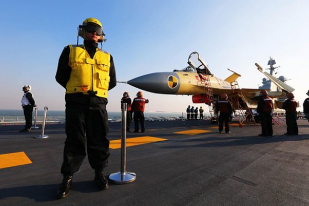A carrier-borne J-15 fighter jet on China’s first aircraft carrier, the Liaoning. (Photo by Xinhua News Agency)
