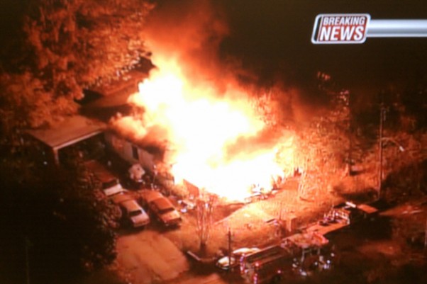 Site where a plane hit a house in Jackson, Miss. (Photo by WLBT)