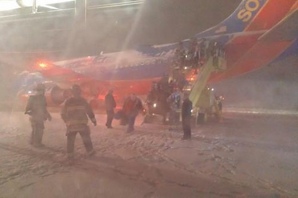 Southwest Airlines Flight 1905 after skidding off runway in Denver. (Photo by @mrbuddylee via Twitter)