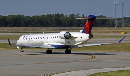 A Delta Connection Bombardier CRJ-900 operated by Mesaba Airlines. (Photo by caribb via Flickr, CC-BY-NC-ND)