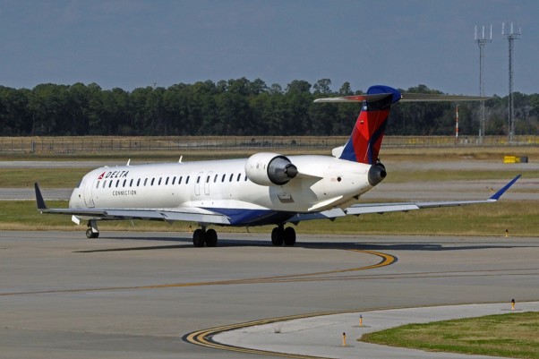 A Delta Connection Bombardier CRJ-900 operated by Mesaba Airlines. (Photo by caribb via Flickr, CC-BY-NC-ND)