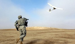 A US Army sergeant launches a AeroVironment RQ-11Raven unmanned aerial vehicle, similar to the drones being sold to the Afghani government. (Photo by Sgt. 1st Class Michael Guillory/US Army)