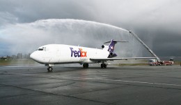 The Riverside Fire Department provides a water arch for the arrival of the Boeing 727-200 (N266FE) that FedEx Express donated to California Baptist University for the school's new aviation science program. The arch represented a symbolic salute on the conclusion of more than 32 years of commercial aviation service by the newly retired aircraft. (Photo by PRNewsFoto/California Baptist University, Kathie Chute)