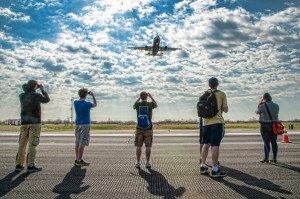 Aviation enthusiasts "running" on runway 22L/4R. (Photo by Zee71)