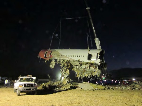 Lifting a portion of the Asiana 214 fuselage off the runway at SFO
